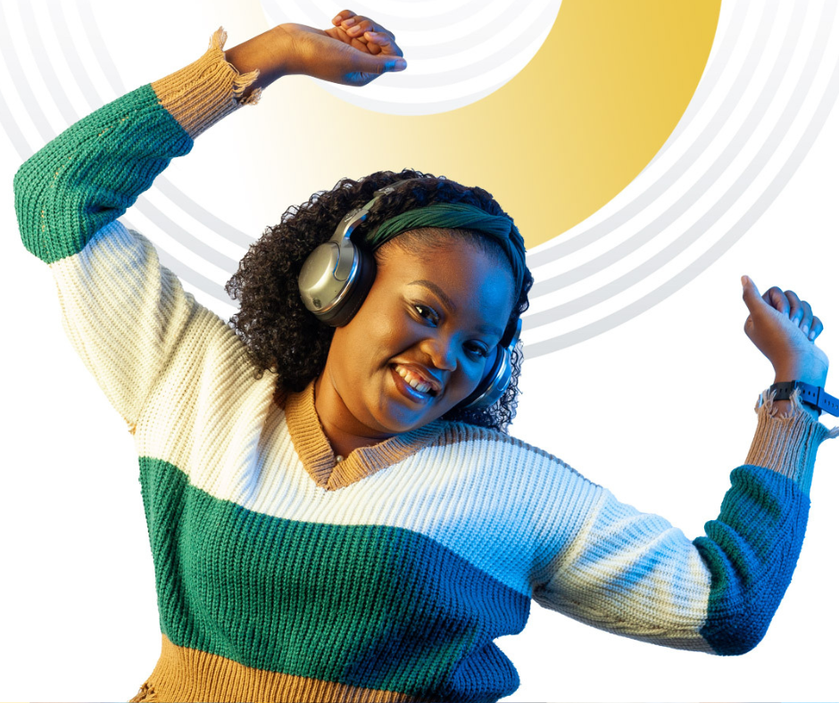 Image of a young female itel employee, wearing headphones and dancing, part of itel's latest campaign to feature their employees as the face of the company. 